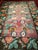 A vivid and visually striking vintage Karabagh kilim from the early 20th century, this room-size flat weave kilim is a...