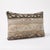 This 16'' x 24'' pillow cover was made from an authentic Turkish rug — faded Oushak bands in taupe, blush and dark brown....