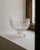 This vintage pressed glass footed bowl from the 1960s is a timeless centerpiece that combines elegant proportions with...