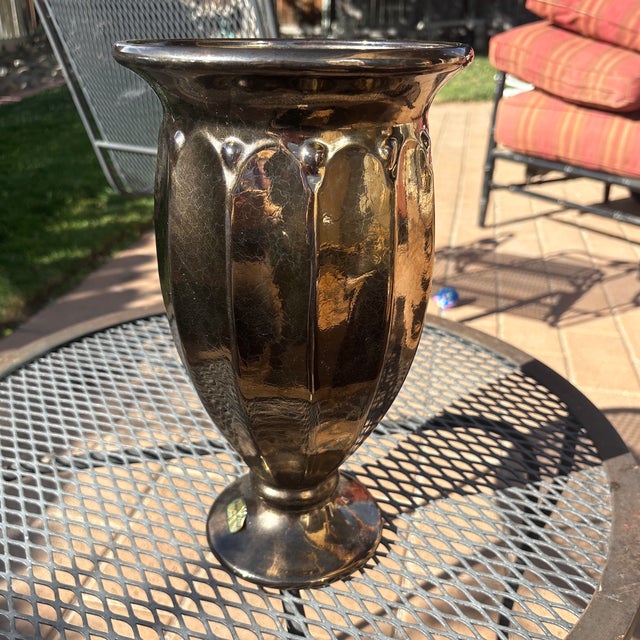 Bring a striking splash of Hollywood Regency glamour or Mid-Century Modern flair to your space with this vintage Haeger...