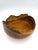 A beautifully hand-carved olive wood bowl, handmade in Peru and finished with a natural live edge that highlights the...
