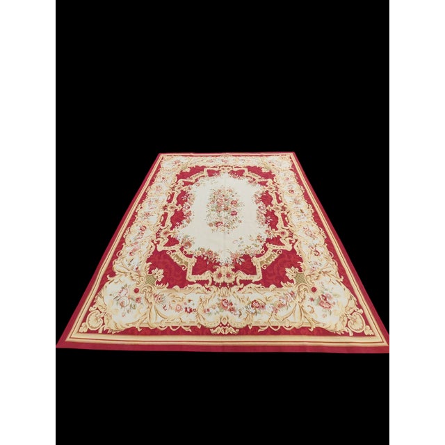 Hand-woven Aubusson rug made using traditional French Aubusson dyeing and weaving methods. This hand-woven Aubusson rug...