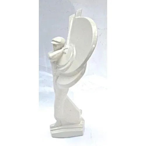 Art Deco ceramic golfer figurine depicting a golfer in mid-swing. The swinging motion conveyed in a stylized Art Deco...