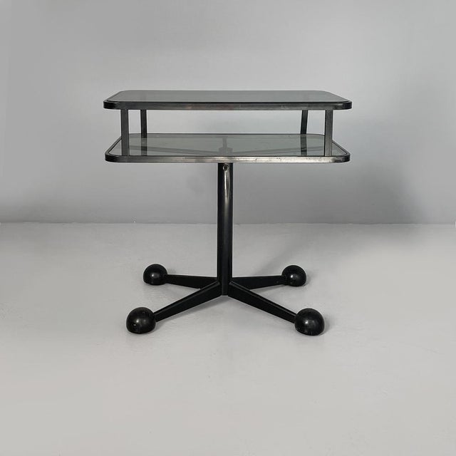 Italian modern black metal and smoked glass cart by Arredamenti Allegri, 1980s Cart with double rectangular shelves with...