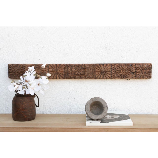 Uncover a piece of history with this authentic architectural carving, salvaged from the structures of 19th-century India....