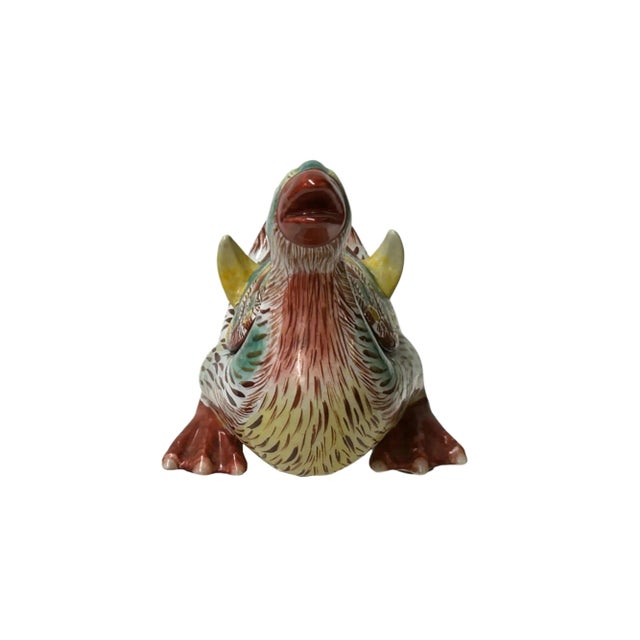 This Hand-Painted Porcelain Duck Figurine is a unique and captivating piece. The open mouth of the duck symbolizes good...
