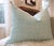 A hand-blocked linen-cotton pillow in Kamala aqua print by designer John Robshaw — a subtle, elegant accent that pairs...
