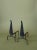 A pair of hand-forged wrought iron scrollwork andirons. Beautiful addition to your firescape.