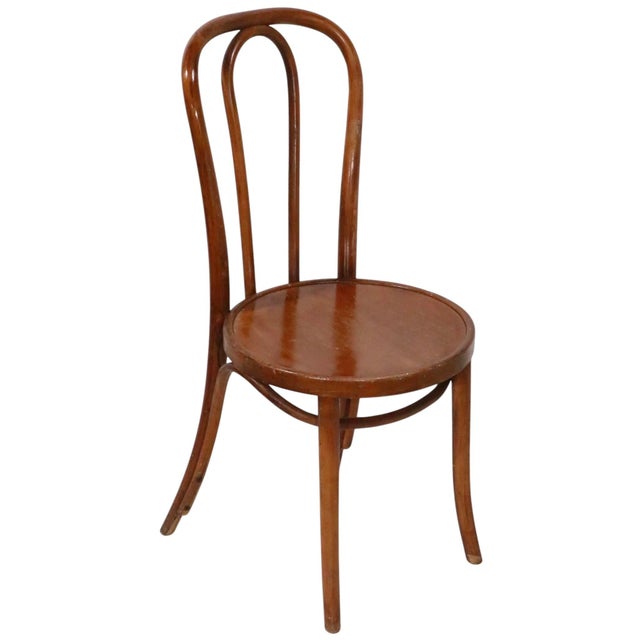Exceptional pair of Vienna Secessionist bentwood cafe, bistro, dining chairs marked Thonet. The chairs are in very good,...