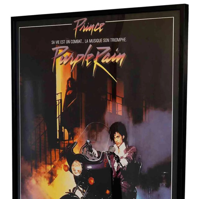 Vintage oversized French movie poster 'Prince - Purple Rain'. Professionally framed by Posteritati, New York. Wired and...