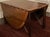 A remarkable oval gateleg dining table crafted from Brazilian Rosewood, designed by Niels Koefoed and manufactured in...