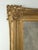 A Victorian giltwood mirror, U.S.A., 19th century. An old Gumps label.