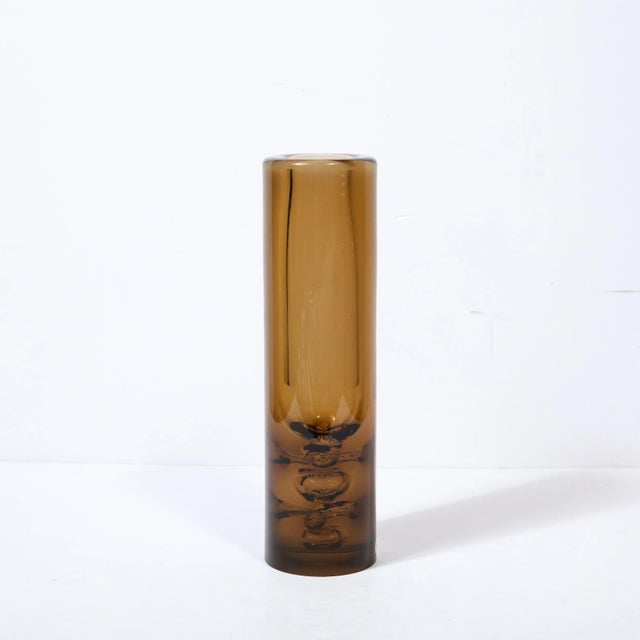 This beautiful Mid Century Modern hand blown glass vase was realized by the esteemed maker Baranek in the Czechoslovakia...