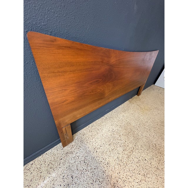 Original condition with nice patina this walnut headboard gives a warm glow that only comes from age. Produced by Young...