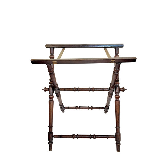 Antique English mahogany butler’s tray table stand only. Could also be used as a luggage stand. Beautifully turned legs....