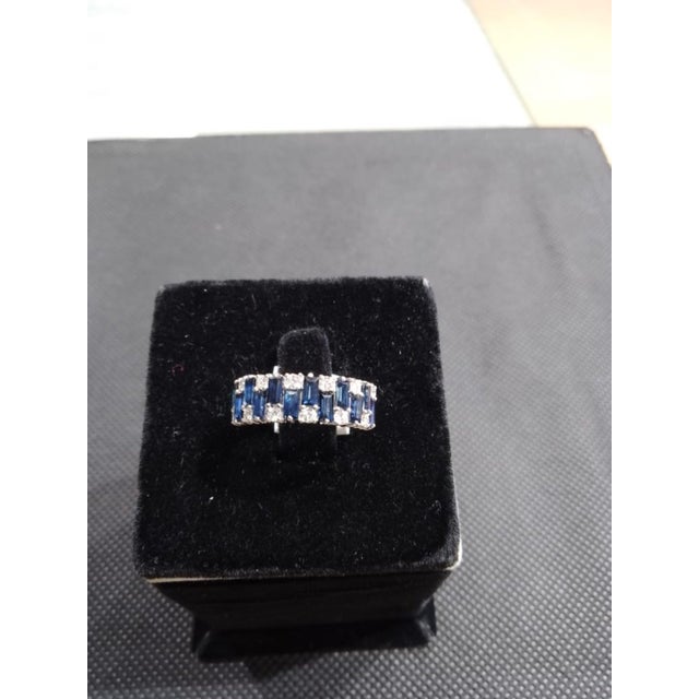 Gemstone details Gold Purity: 18K Solid Gold Blue sapphire: 1.95 cts Diamond: 0.40 cts 18K gold Net weight: 3.81 grams...