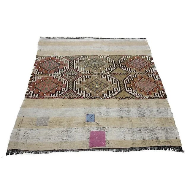 Vintage handwoven decorative kilim rug from Marash region of Turkey. Approximately 55-65 years old. In good condition