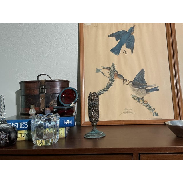 Add a touch of mid-century artistic flair to your decor with this striking brutalist candleholder. Crafted from cast metal...