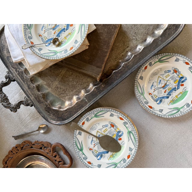 A charming and increasingly collectible set of ten antique English plates featuring the Farmers Arms motif, produced by B....