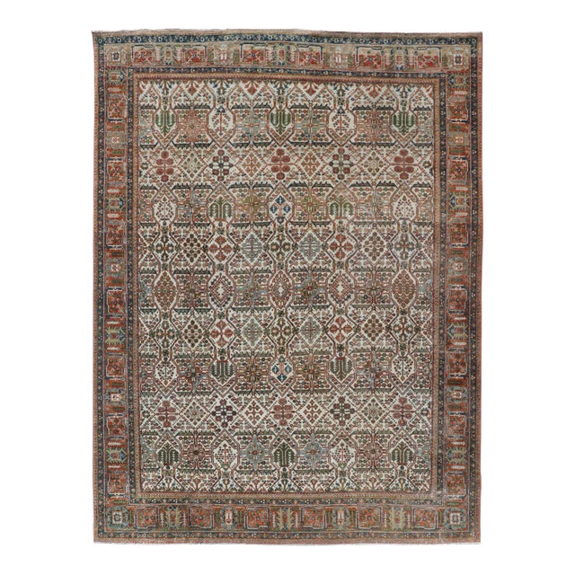 Antique Persian Joshegan Rug in Ivory Background With Blue, Green, & Copper For Sale