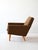 Vintage Scandinavian armchair of Swedish origin. The seat, which includes the armrests, is lined with original period...