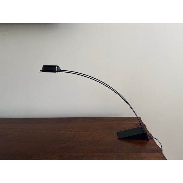 Robert Sonneman created this design for George Kovacs. The piece is often referred to as a paper clip style lamp and it is...