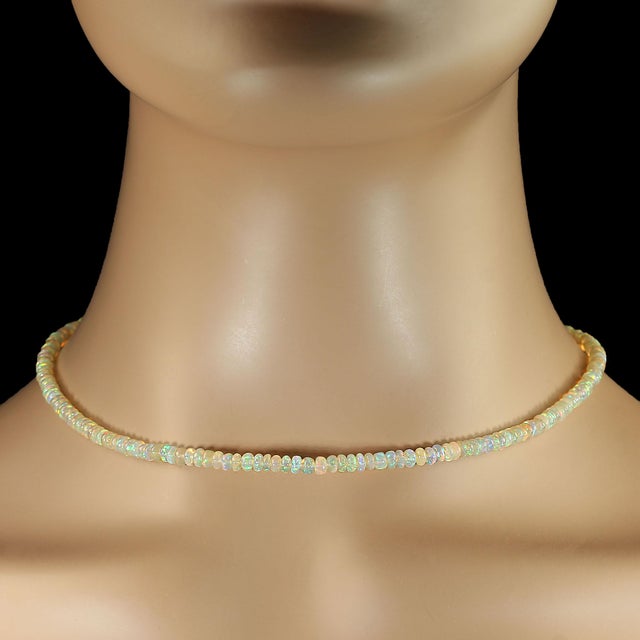 Elevate your jewelry collection with this exquisite 16-inch opal necklace, a timeless piece that radiates elegance and...
