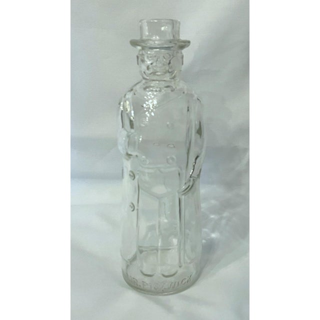 Adorable glass bottle from the 1930's designed as Mr. Pickwick from Dicken's "Pickwick Papers". Originally held vinegar
