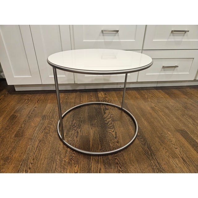 The Cannot™ occasional table pairs a minimalist base structure with a painted wood top. The gloss painted top can be used...