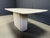 Elegant travertine dining table with a beautiful naturally veined table top with a beveled edge. Timeless piece. 1970s -...
