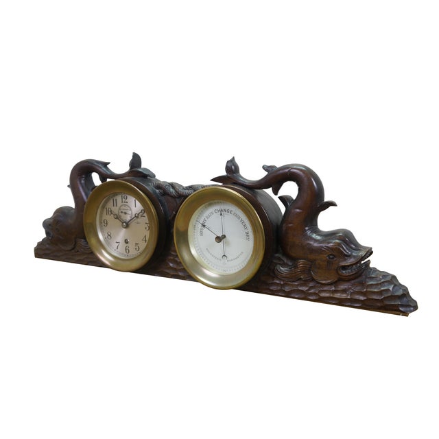 Rare mid century nautical maritime theme Chelsea Ship's Clock and Barometer set featuring a carved mahogany case with...