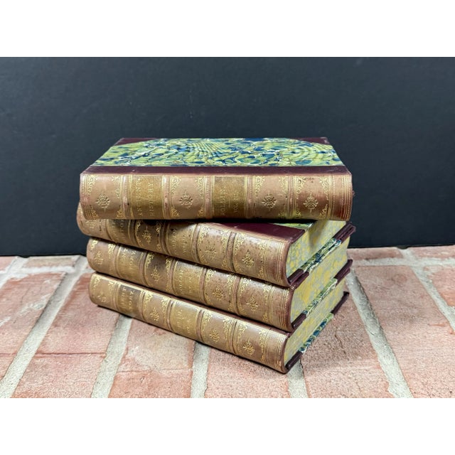 This complete set of antique ‘Ancient History’ books with leather wrapped bindings and marbled paper hardcovers would make...