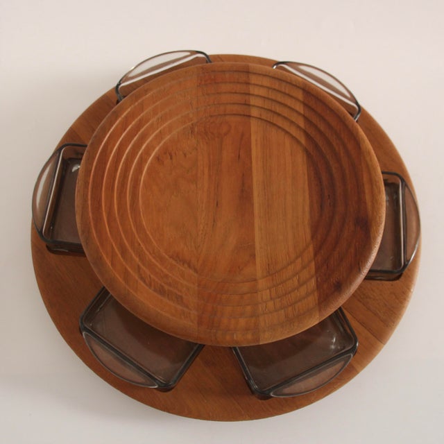 Teakwood carousel with 6 rectangular glass bowls. Typical Danish design from the 1960s. Practical and decorative object....