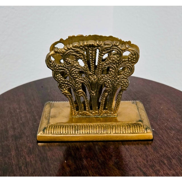 Add timeless charm to your desk with this beautiful brass letter holder by Anna Griffin for Two's Company. Featuring an...