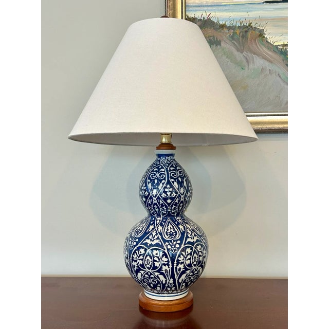 Ralph Lauren Blue and White Double Gourd Porcelain Table Lamp with Floral Motif Elevate your interior with this elegant...