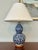 Ralph Lauren Blue and White Double Gourd Porcelain Table Lamp with Floral Motif Elevate your interior with this elegant...