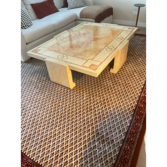 This substantial statement piece features a hand finished faux marble surface in warm cream, subtle gold and terracotta...