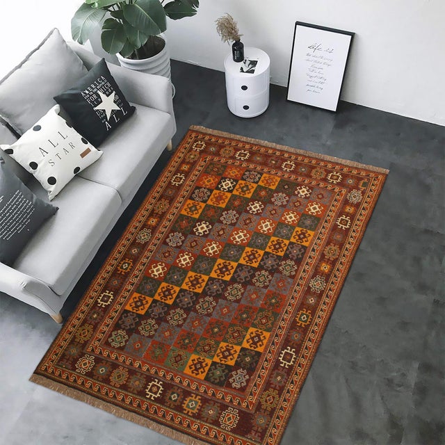 Experience the exceptional craftsmanship of this breathtaking Soumak rug, expertly created by skilled master weavers. Made...