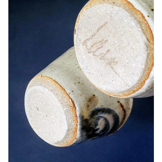 Incised signature Art pottery, with a salt glaze Hand painted