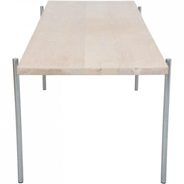 Coffee table with a table top of oak and steel legs. The table is from the 1970s and appears in good condition with some...