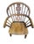 A Childs Windsor chair made of Ash, with turned legs and arm posts and a Crinoline stretcher typical of the type of chair...