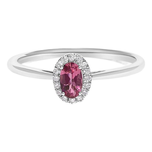 10K White Gold 5X3MM Oval Pink Tourmaline and Diamond Accent Halo Ring (I-J Color, I1-I2 Clarity) - Ring Size 5.5 For Sale