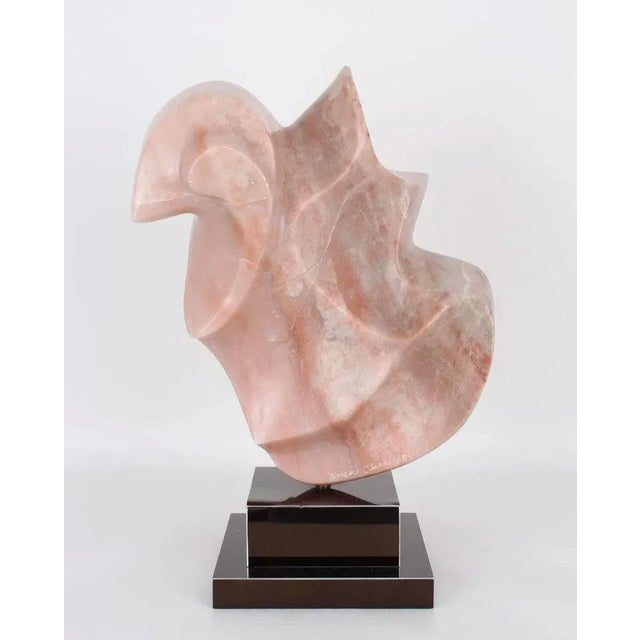 Abstract Pink Alabaster Sculpture by Karen Chera, signed and dated '88. on its original metal base.