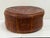 Hand-tooled vintage leather ottoman or pouf from Peru, featuring magnificent embossed pre-Columbian or Incan-inspired...