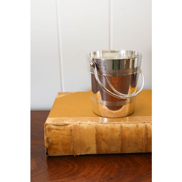 Stamped "PB". Includes Strainer
