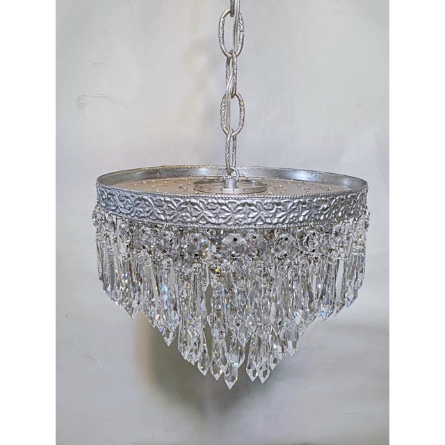 Elevate your interior styling with the icy glamour and shimmering brilliance of this vintage three-tier crystal waterfall...