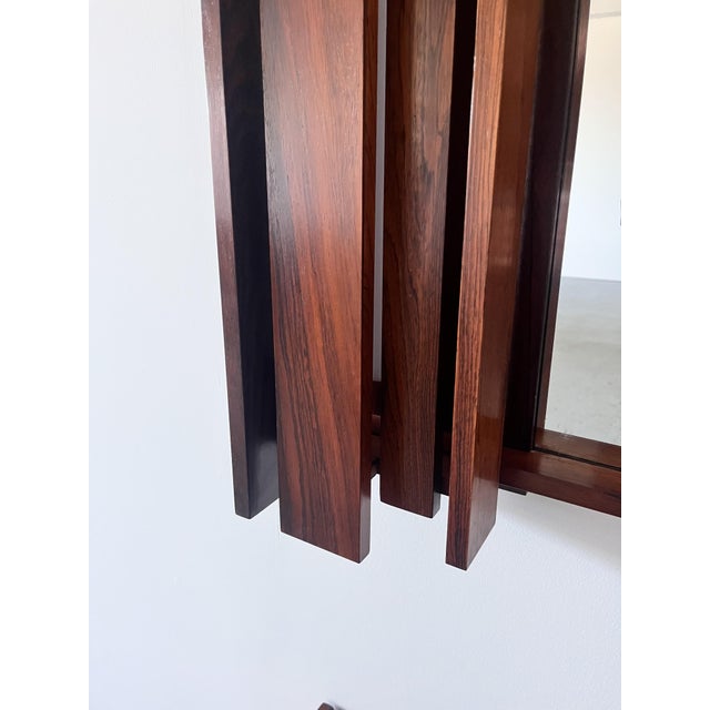 A wonderful mirror and cabinet set from Norway, circa the 1970s. The perfect set for a hallway. The furniture is in its...