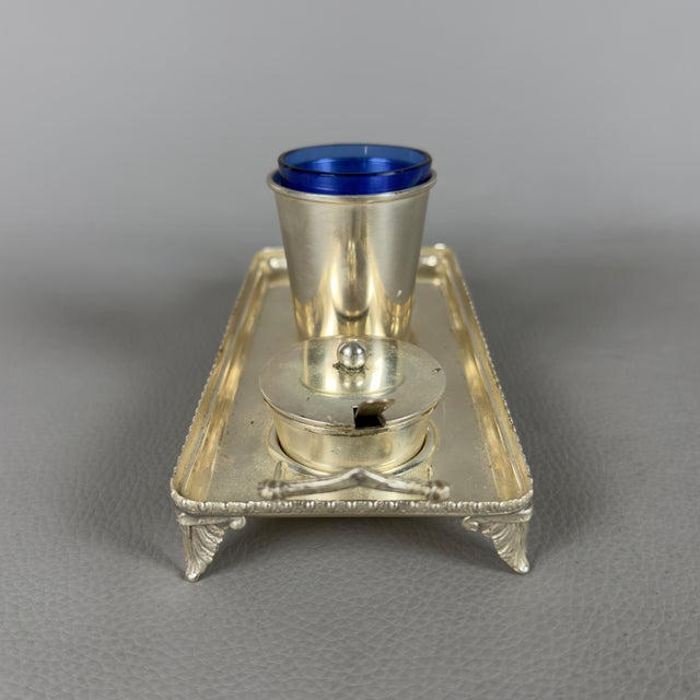 A refined and exclusive complete table service in solid 800 silver and cobalt blue glass, a perfect fusion of the noble...