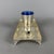 A refined and exclusive complete table service in solid 800 silver and cobalt blue glass, a perfect fusion of the noble...