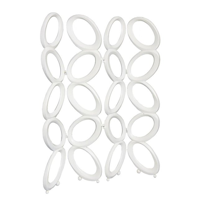 This very chic vintage modernist room divider or screen is from the 60;s. It has angled circles on more oval form. it is...
